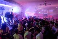 a crowd of people at a nightclub